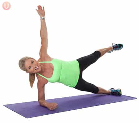 Chris Freytag demonstrating forearm star plank