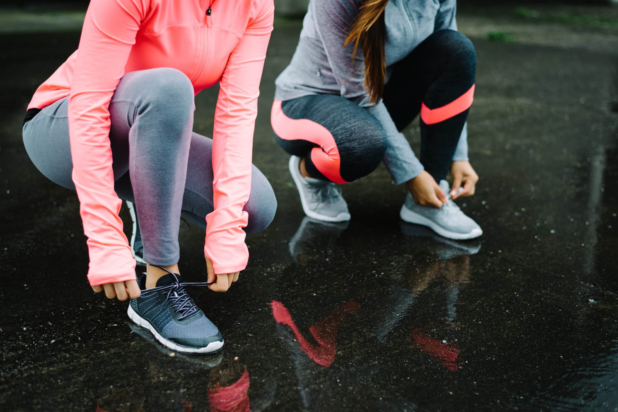 Women wearing athletic shoes.